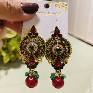 Gold Temple Peacock Drop Earrings with Red Bead Accent